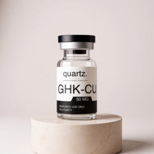 GHK-Cu 50mg research vial on travertine pedestal – Quartz Peptides
