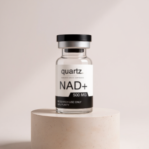 NAD+ 500mg research vial on travertine pedestal – Quartz Peptides